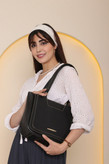 کیف زنانه مدل دستی و رودوشی طرح دوخت نما جنس چرم مصنوعی شرانگ خارجی