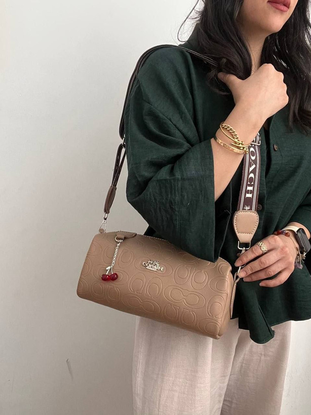کیف زنانه پاسپورتی مارک coach جنس چرم مصنوعی خارجی
